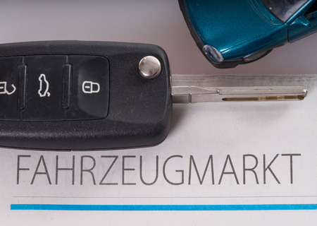 car key and vehicle market newspaperの写真素材
