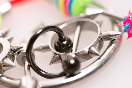 different piercings on a gray backgroundの写真素材