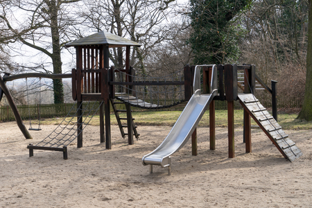 Playground for children with slide and climbing frame