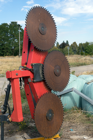 Attachment for a tractor with large saw bladesの写真素材