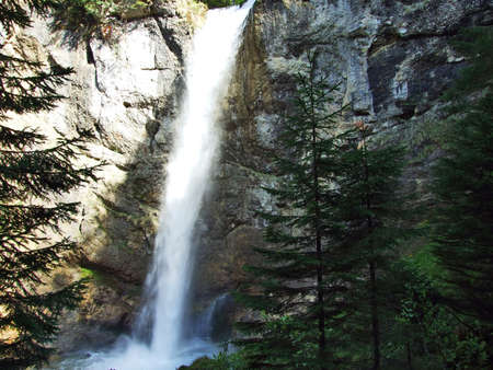 The shady Leuenfall waterfall in Canton St. Gallen, Switzerlandの写真素材