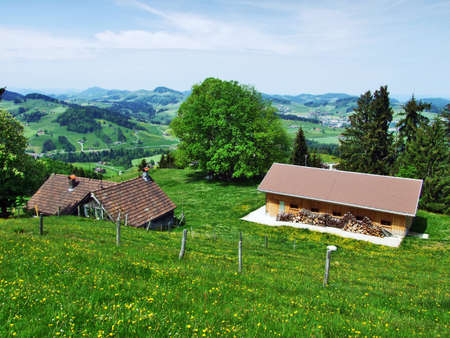 Farms and pastures of the ZÃ¼rchersmÃ¼hle village - Canton of Appenzell Ausserrhoden, Switzerlandの写真素材