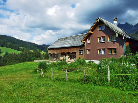 Alps architecture and farms of the Obertoggenburg region - Canton St. Gallen, Switzerlandの写真素材