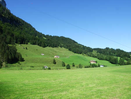 Picturesque pastures and hills in the Appenzellerland area - Canton of Appenzell Innerrhoden, Switzerlandの写真素材