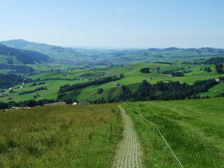 Picturesque pastures and hills in the Appenzellerland area - Canton of Appenzell Innerrhoden, Switzerlandの写真素材