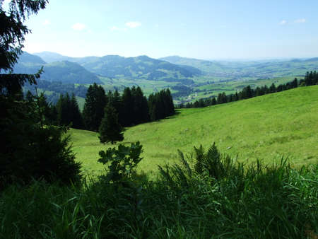 Picturesque pastures and hills in the Appenzellerland area - Canton of Appenzell Innerrhoden, Switzerlandの写真素材