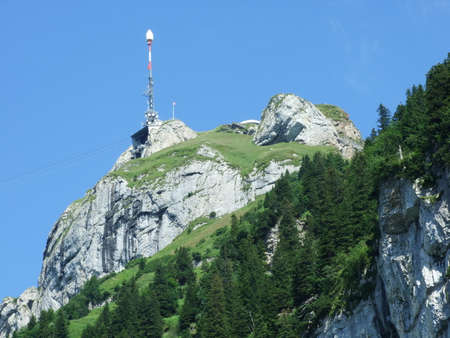 View to the peak Hoher Kasten in mountain mass Alpstein - Canton of Appenzell Innerrhoden, Switzerlandの写真素材