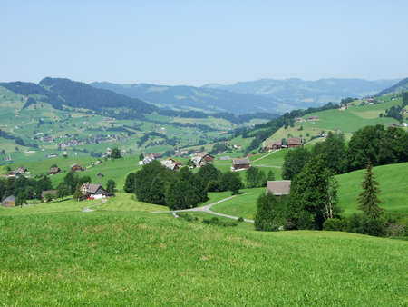 Picturesque pastures and hills of the Obertoggenburg area - Canton of St. Gallen, Switzerlandの写真素材