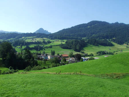 Picturesque pastures and hills of the Obertoggenburg area - Canton of St. Gallen, Switzerlandの写真素材