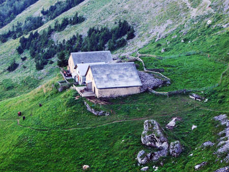 Farms and pastures on tableland mountain ranges Alpstein - Canton of St. Gallen, Switzerlandの写真素材