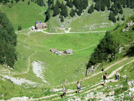 Farms and pastures on tableland mountain ranges Alpstein - Canton of St. Gallen, Switzerlandの写真素材