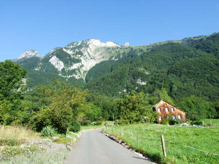 Farms and pastures on tableland mountain ranges Alpstein - Canton of St. Gallen, Switzerlandの写真素材