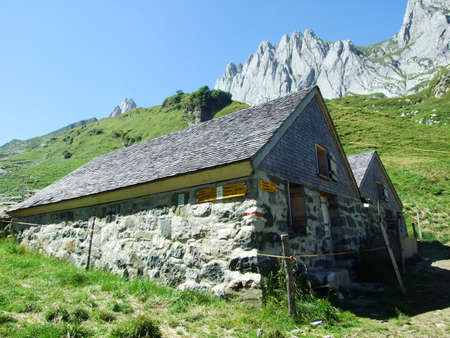 Farms and pastures on tableland mountain ranges Alpstein - Canton of St. Gallen, Switzerlandの写真素材