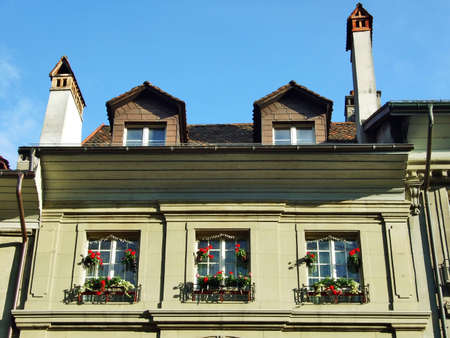 Windows on the floor of a private residential building in the city center of Bern - the capital of the Swiss Confederationのeditorial素材