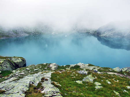 Alpine Lake Schottensee under the Pizol peak in the mountain range Glarus Alps - Canton of St. Gallen, Switzerlandの写真素材