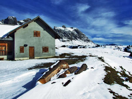 A late autumn atmosphere on pastures and farms in the valley of Seez river and on the Malun mountain plateau - Canton of St. Gallen, Switzerlandの写真素材