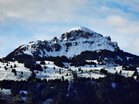Winter and snow on the Alpine peaks in the mountain range Glarus Alps - Canton of St. Gallen, Switzerlandの写真素材