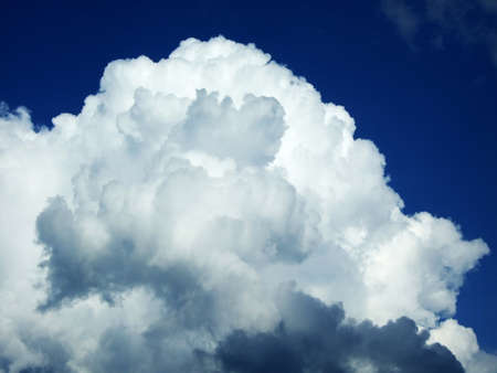 Spring clouds in the sky above the Churfirsten mountain range - Canton of St. Gallen, Switzerlandの写真素材