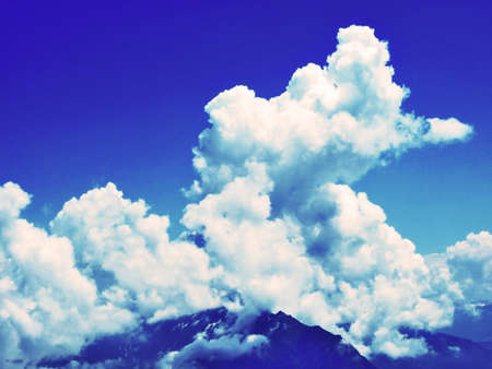 The beautiful clouds over the Alps and the river Rhine valley (Rheintal) - Canton of St. Gallen,...