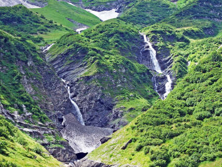 Waterfalls on the Mitteleggbach stream in the Wichlen Alpine Valley - Canton of Glarus, Switzerlandの写真素材