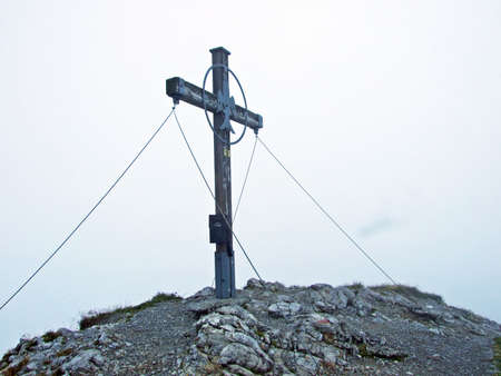 Alpine mountain peak Kuegrat over the Rhine river valley (Rheintal) and in the Liechtenstein Alps - Schaan, Liechtensteinの写真素材