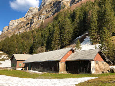 Rural traditional architecture with livestock farms in the Appenzellerland region and on the Alpstein mountain range - Canton of Appenzell Innerrhoden (AI), Switzerlandの写真素材