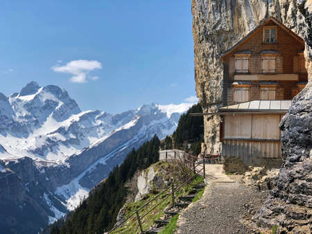 Landscape of the mountain Ebenalp and the mountain restaurant under the Ascher cliff in the Appenzellerland region - Canton of Appenzell (AI), Switzerlandの写真素材