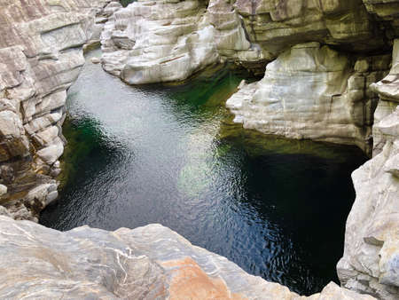 Granite rock formations in the Maggia river in the Maggia Valley or Valle Maggia, Tegna - Canton of Ticino, Switzerlandの写真素材