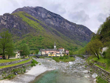 The village of Bignasco with old stone bridges on the rivers Bavona and Maggia - Canton of Ticino, Switzerlandの写真素材