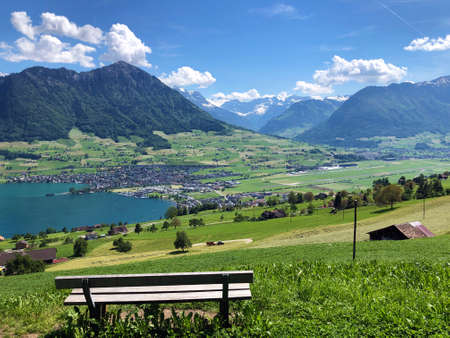 Settlement Buochs on the shores of Lake Luzerne or Vierwaldstaettersee (Vierwaldsattersee), at the end of the Engelbergertal Valley and Mountain Buochserhorn - Canton of Nidwalden, Switzerlandの写真素材