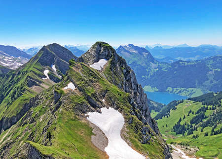 Rossalpelispitz or Rossaelplispitz and Zindlenspitz Mountains above the alpine Lake WÃ¤gitalersee (Waegitalersee or Wagitalersee), Innerthal - Canton of Schwyz, Switzerland (Kanton Schwyz, Schweiz)の写真素材