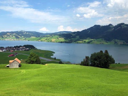 Traditional architecture and farmhouse in the valley of Lake Sihlsee, Gross - Canton of Schwyz, Switzerland (Kanton Schwyz, Schweiz)の写真素材