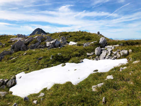 Rapid melting of snow due to global warming in the Swiss Alps, Innerthal - Canton of Schwyz, Switzerland (Kanton Schwyz, Schweiz)の素材 [FY310159399233]