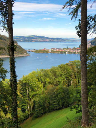 Deciduous trees and forests over the Lake Lucerne or Vierwaldstaetersee lake (Vierwaldstattersee) and Alpnachersee Lake, Alpnach - Canton of Obwalden, Switzerland / Schweizの写真素材