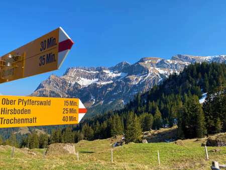 Mountaineering signposts and markings on the hills over the Eigental alpine valley and in central Switzerland, Eigenthal - Canton of Lucerne, Switzerland (Kanton Luzern, Schweiz)の写真素材