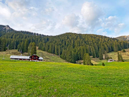 Traditional rural architecture and family livestock farms on the slopes of the Pilatus mountain...