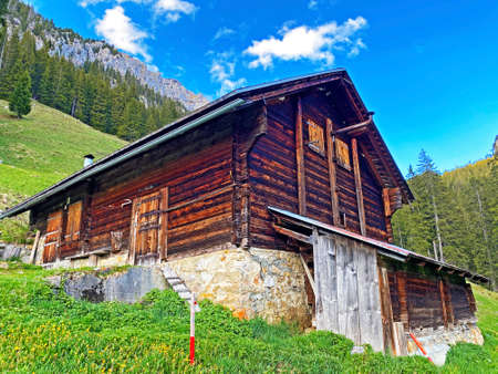Traditional rural architecture and family livestock farms on the slopes of the Pilatus mountain massif, Alpnach - Canton of Obwalden, Switzerland (Kanton Obwald, Schweiz)の写真素材