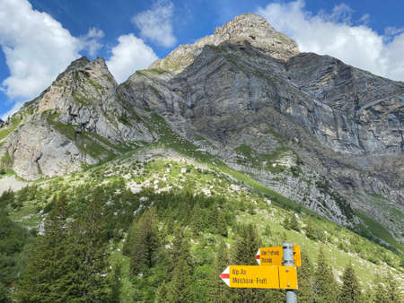 Mountaineering signposts and markings on the slopes of the Melchtal alpine valley and in the Uri Alps mountain massif, Kerns - Canton of Obwalden, Switzerland (Kanton Obwald, Schweiz)の写真素材