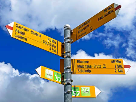 Mountaineering signposts and markings on the slopes of the Melchtal alpine valley and in the Uri Alps mountain massif, Kerns - Canton of Obwalden, Switzerland (Kanton Obwald, Schweiz)の写真素材