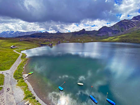 The alpine lake Melchsee or Melch Lake in the Uri Alps mountain massif, Kerns - Canton of Obwalden, Switzerland (Kanton Obwald, Schweiz)の写真素材