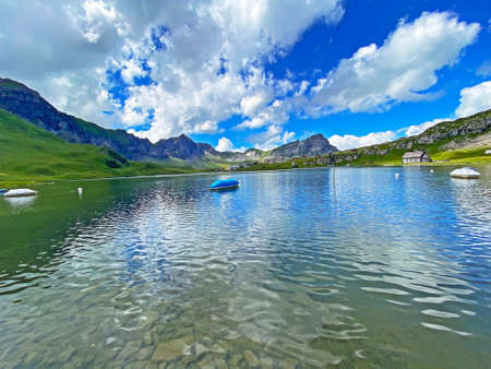 The alpine lake Melchsee or Melch Lake in the Uri Alps mountain massif, Kerns - Canton of Obwalden, Switzerland (Kanton Obwald, Schweiz)の写真素材
