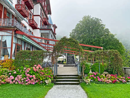 Grand Hotel Giessbach above Lake Brienz and next to the waterfall Giesbach Falls - Canton of Bern, Switzerland / Grandhotel Giessbach oberhalb des Brienzersees und neben den GiessbachfÃ¤lle - Schweizのeditorial素材
