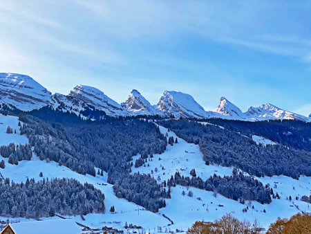 Winter alpine snow peaks of the Churfirsten mountain range between Lake Walenstadt or Lake Walen...