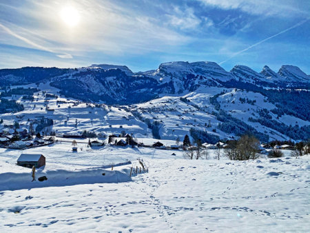 Winter alpine snow peaks of the Churfirsten mountain range between Lake Walenstadt or Lake Walen (Walensee) and the Thur river valley, Unterwasser - Canton of St. Gallen, Switzerland (Schweiz)の写真素材