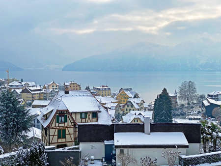 The subalpine settlement of Weggis below Mountain Rigi and along the shores of Lake Lucerne (VierwaldstÃ¤ttersee or Vierwaldstaettersee) - Canton of Lucerne, Switzerland (Schweiz)の写真素材