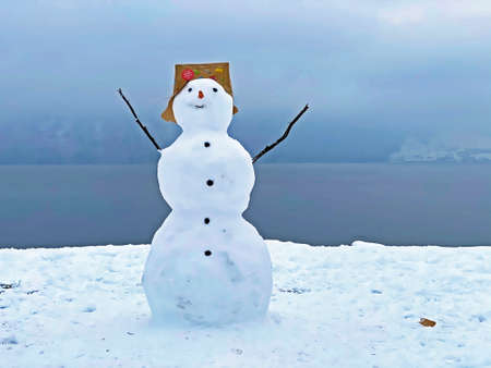 Snowman in the subalpine settlement of Weggis and along the shores of Lake Lucerne...