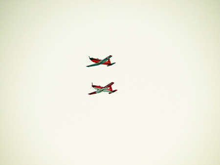 Swiss sports planes in the gloomy winter sky, Amden - Canton of St. Gallen, Switzerland (Schweiz)の写真素材