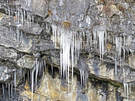 Winter glaciers and frozen water formations in the Swiss Alps and along Lake Walen or Lake Walenstadt (Walensee), Weesen - Canton of St. Gallen, Switzerland (Kanton St. Gallen, Schweiz)の写真素材