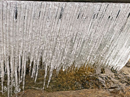 Winter glaciers and frozen water formations in the Swiss Alps and along Lake Walen or Lake Walenstadt (Walensee), Weesen - Canton of St. Gallen, Switzerland (Kanton St. Gallen, Schweiz)の写真素材