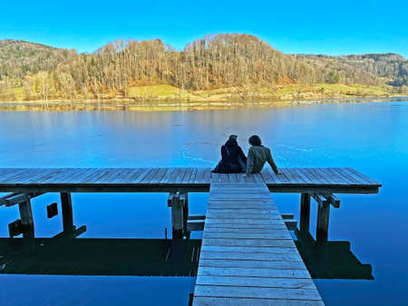 Late winter and early spring on the TÃ¼rler Lake or TÃ¼rlersee Lake (Tuerlersee oder Turlersee), Aeugst am Albis - Canton of ZÃ¼rich, Switzerland (Schweiz)の写真素材